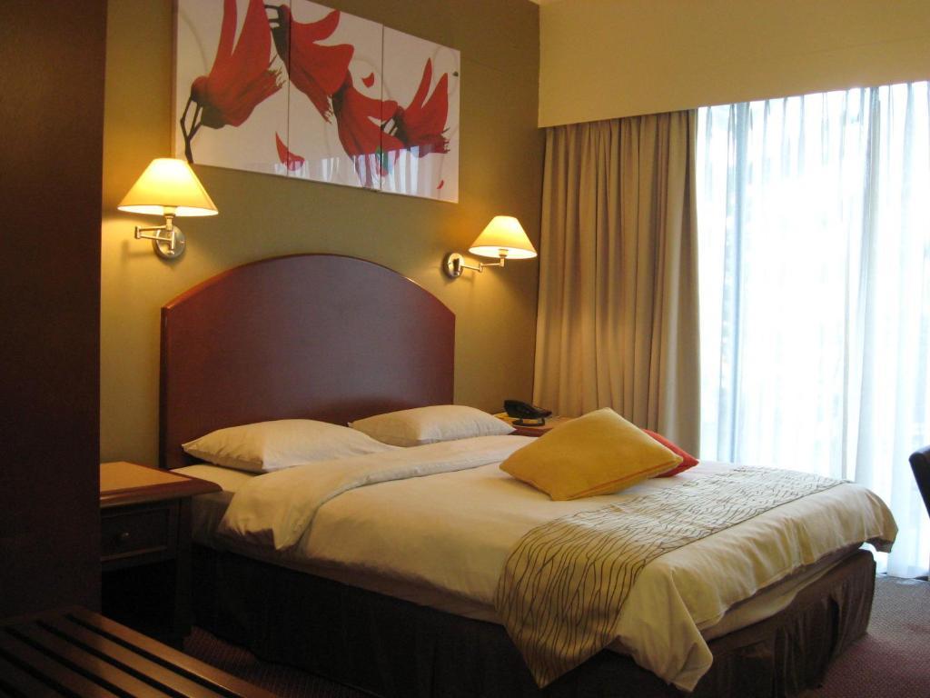 Casuarina Hotel Кота-Кинабалу Номер фото